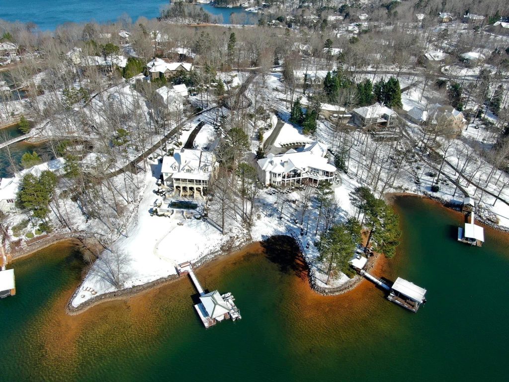 lake homes covered in snow